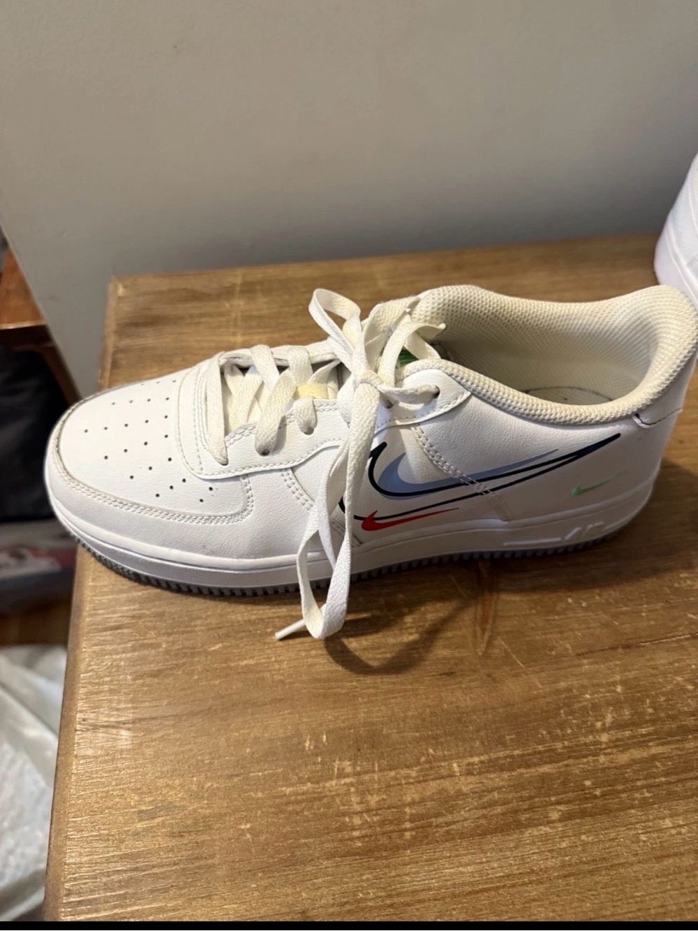Nike Kids White Low-Top Sneakers with Multicolor Swoosh Accents